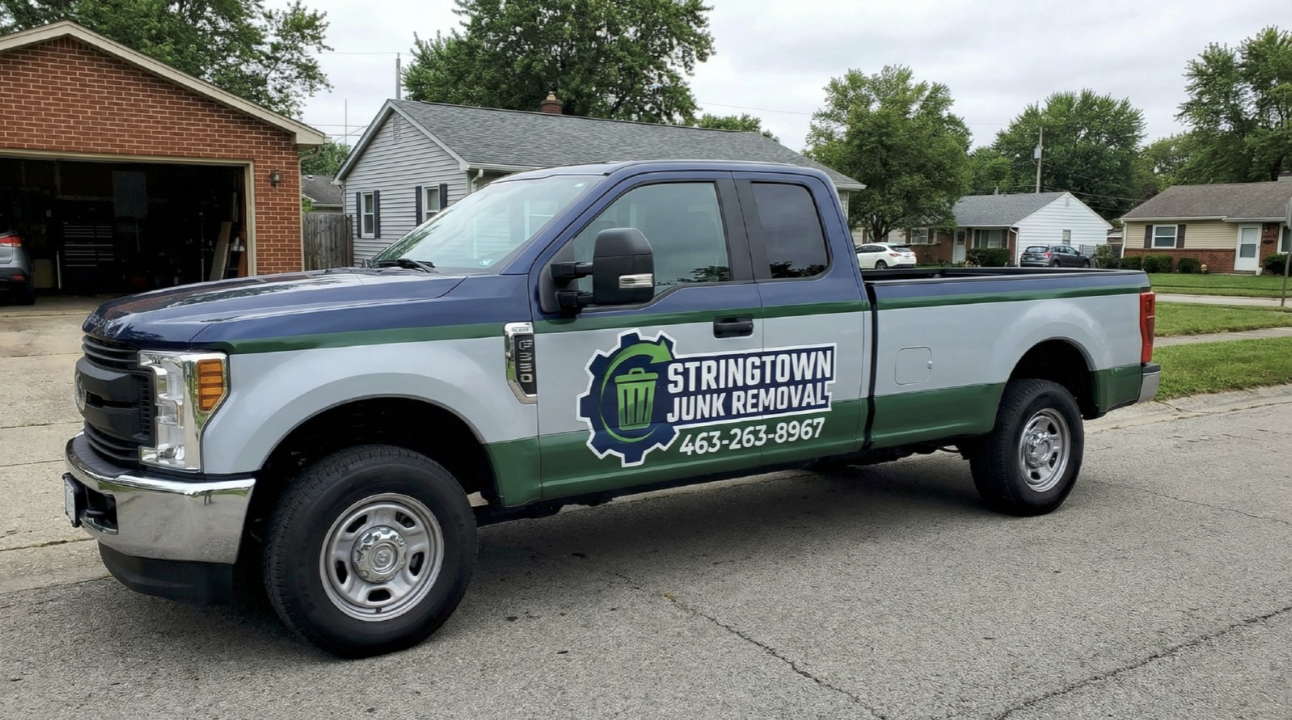 Stringtown Junk Removal team hauling junk in Indianapolis